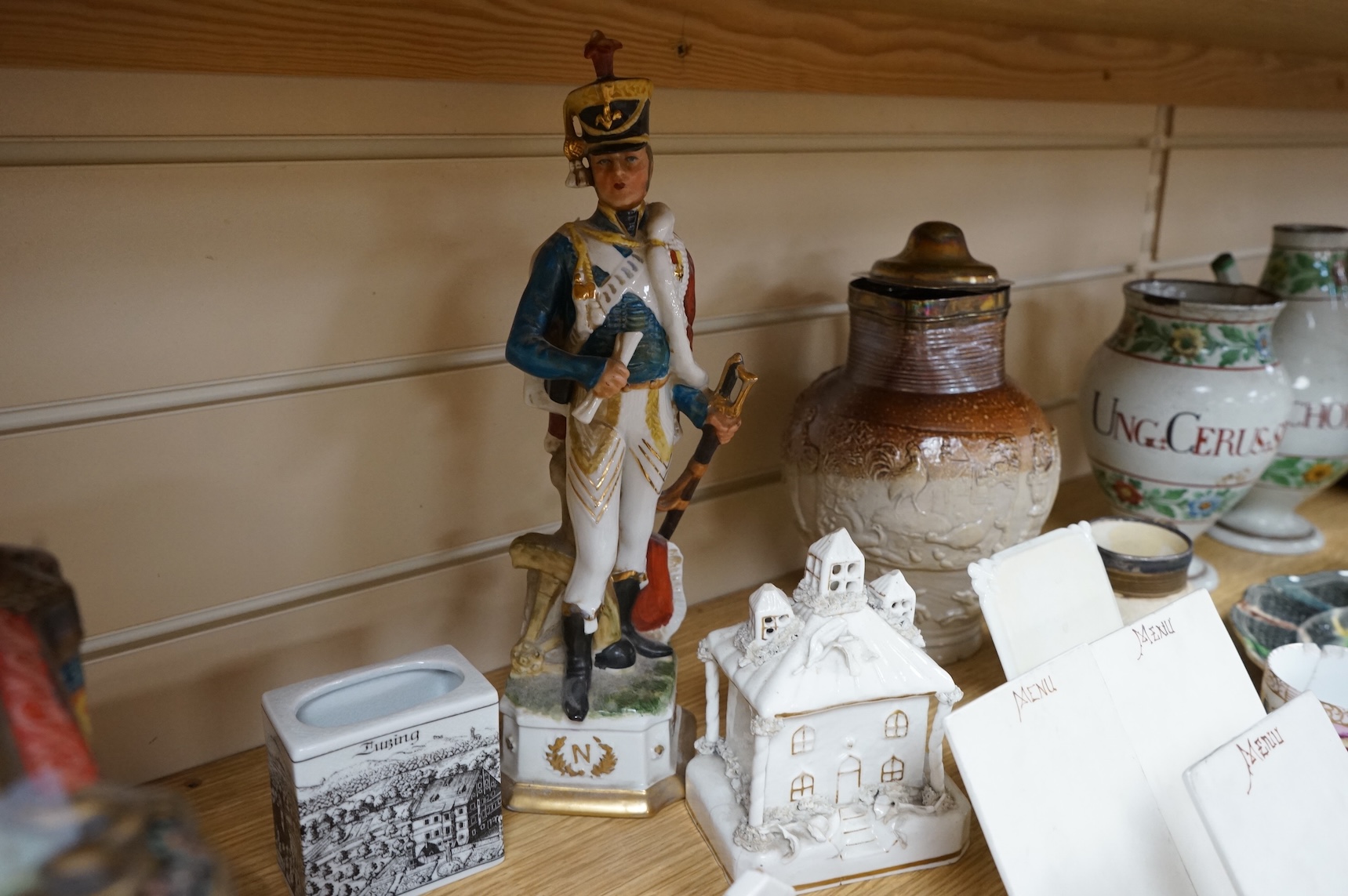 A group of Continental ceramics including two late 18th/early 19th century Italian maiolica wet drug jars, a Staffordshire Whieldon type tortoiseshell glazed plate c.1770 and a silver mounted Mortlake stoneware jug, 24cm